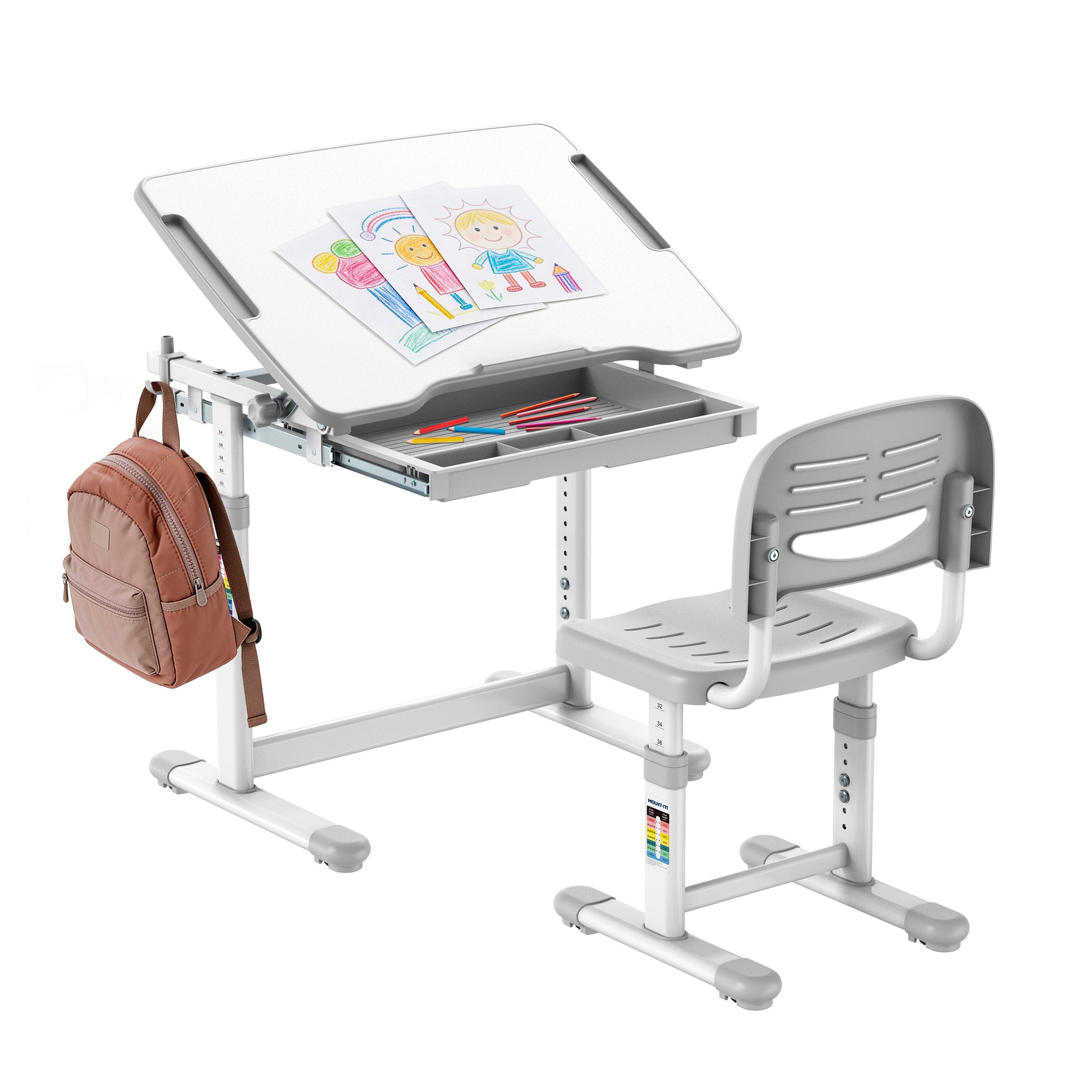 MI-10201_Main_02 The Mount-It! Kids Desk and Chair Set for ages 3-10 features height adjustment, a tilting desktop, cartoon drawing, colored pencils in a pull-out tray, and space to hang a pink backpack on the side.