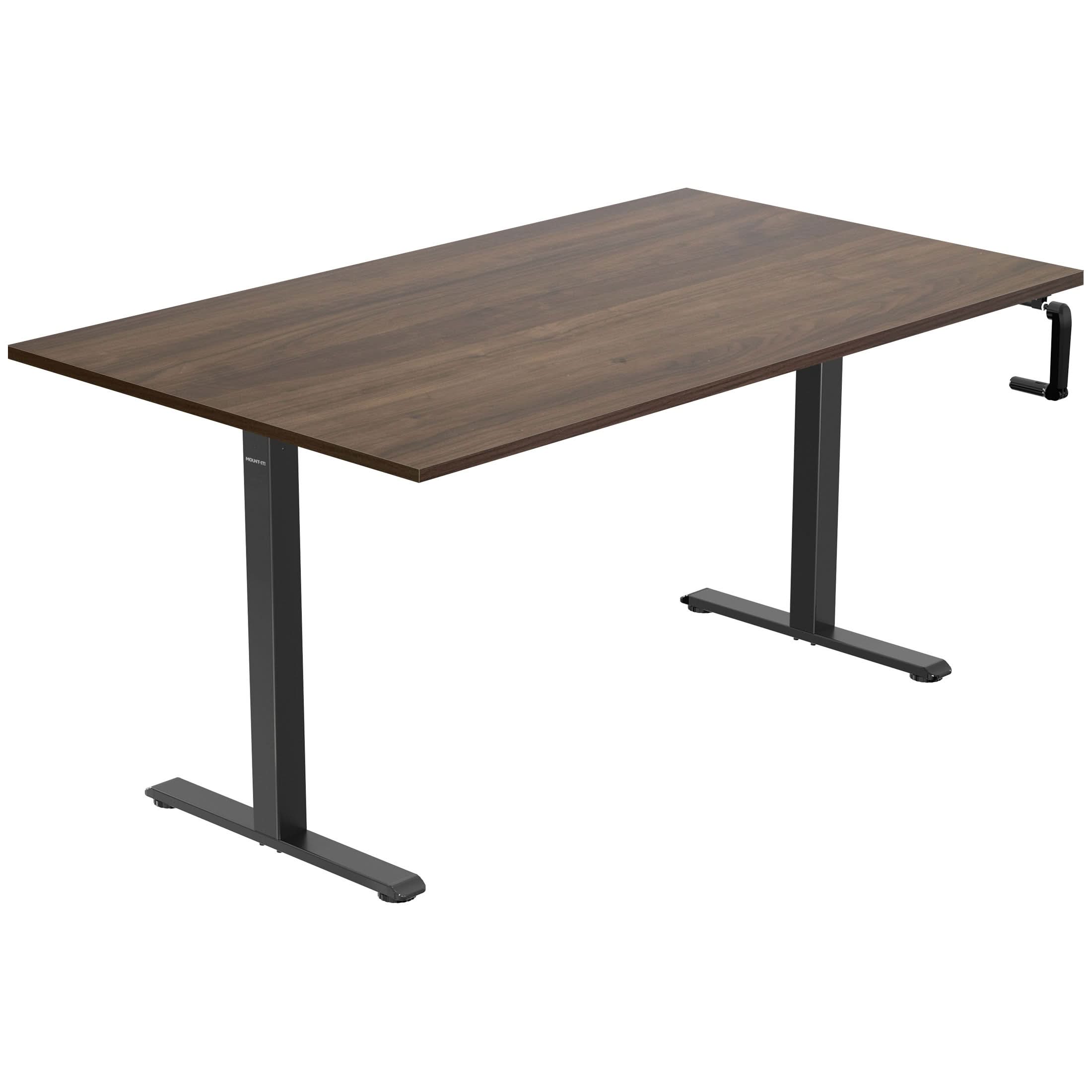 MI-18092_Main_01 The Mount-It! Hand Crank Standing Desk features a 55" rectangular dark wood tabletop and black metal legs, with a manual hand crank on the right side for easy height adjustment.