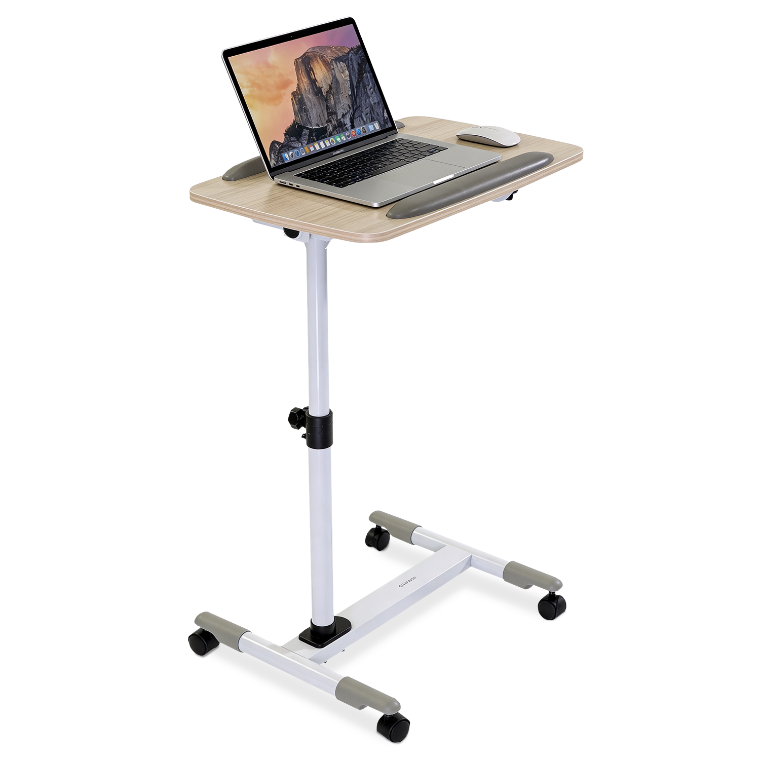 MI-7946_Main_2 The Mount-It! Height Adjustable Rolling Laptop Cart in white features a wood finish top, silver legs, and four caster wheels—perfect as an over-bed laptop tray or mobile workstation. A laptop and mouse sit on the tabletop for easy access.